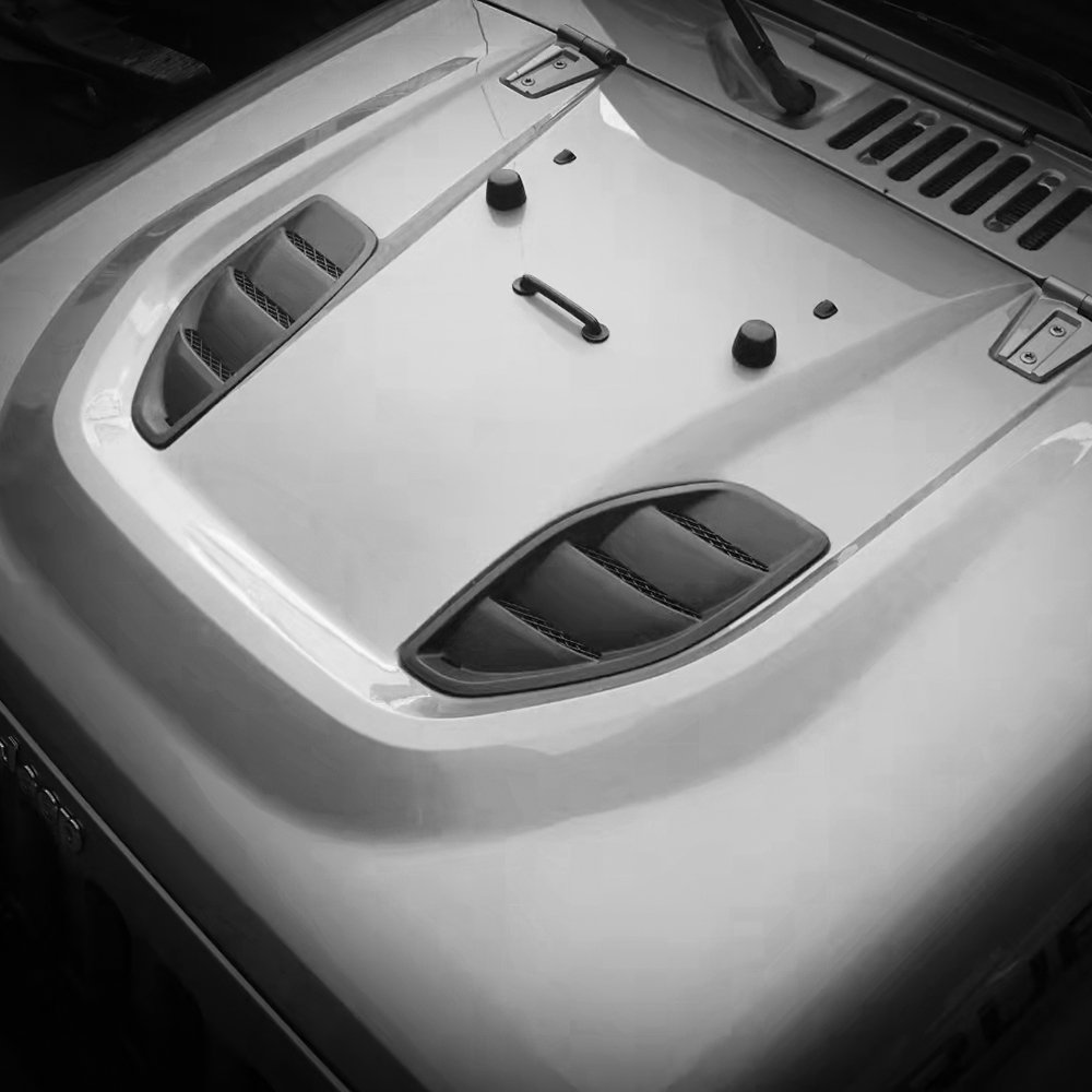 Vented hood installed on silver Jeep Wrangler JK